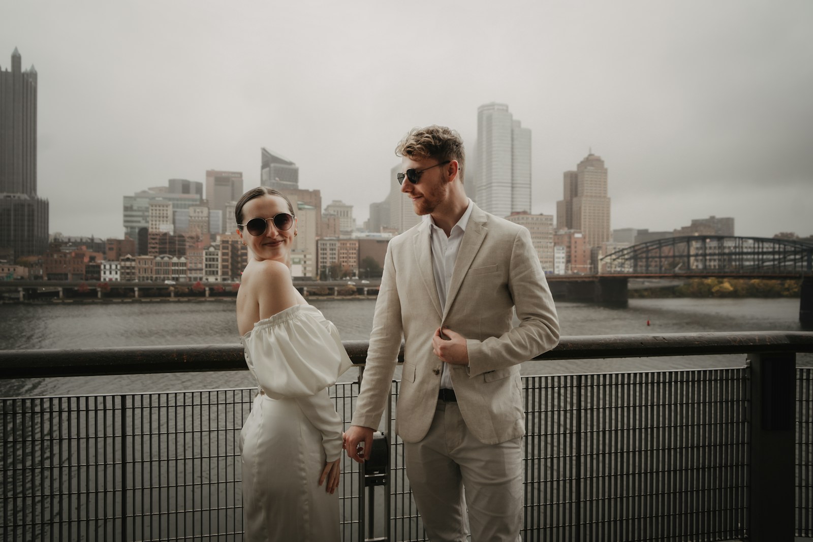 a man and a woman standing next to each other
